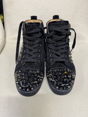 Black spike high top sneakers size 8for men’s size 10 for women’s,